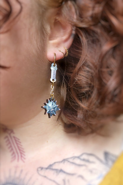 Armurerie Aquatique - boucle d’oreille à l’unité